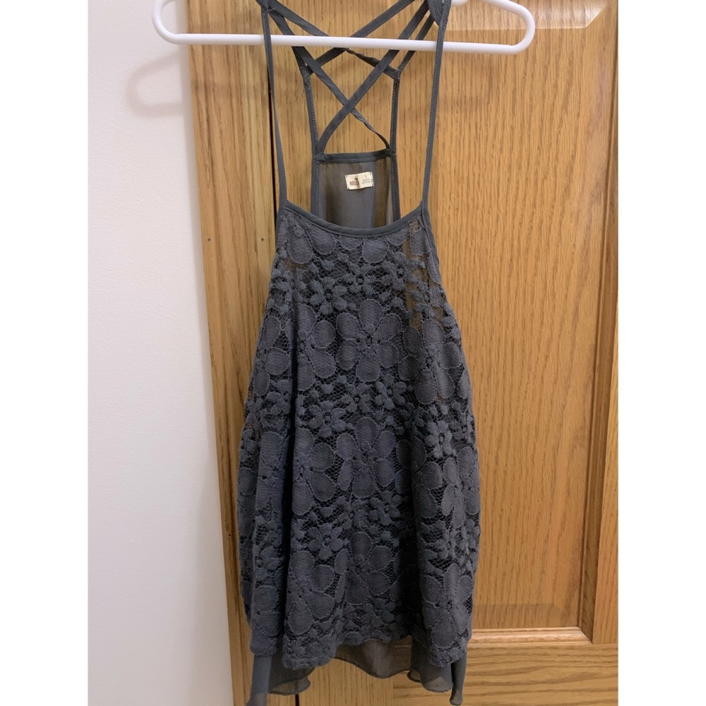 Floral lace front halter tank top. Crossed strap
